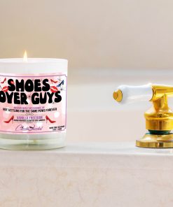 Shoes Over Guys Bathtub Side Candle